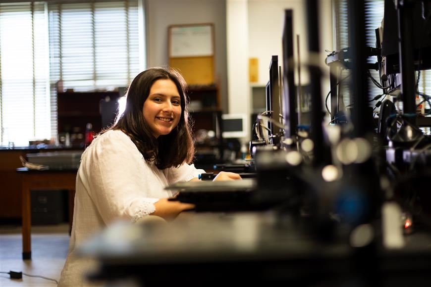Image of student at desk with computer